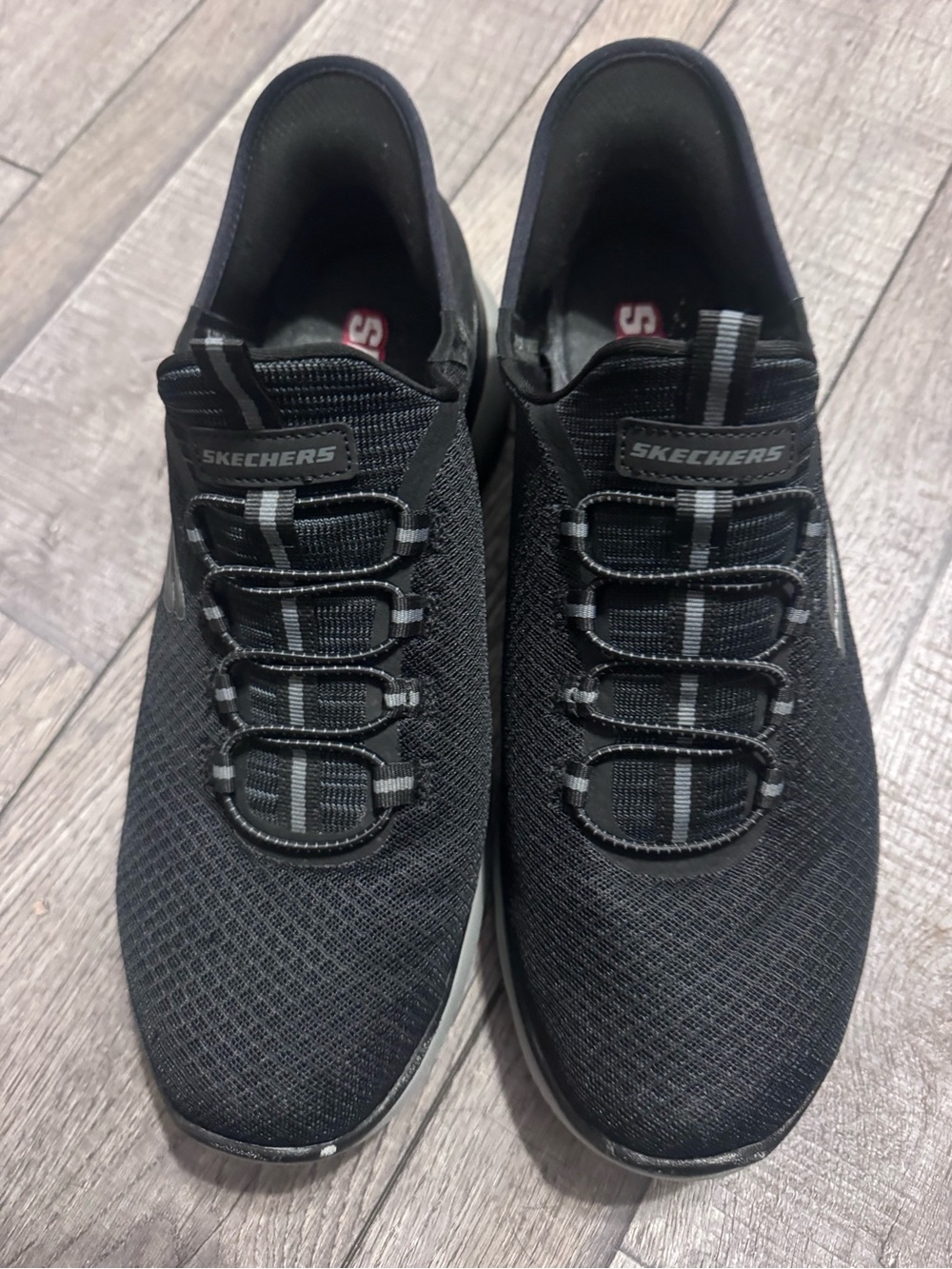 Skechers Men's Black Slip-On Athletic Sneakers with Reflective Stripe